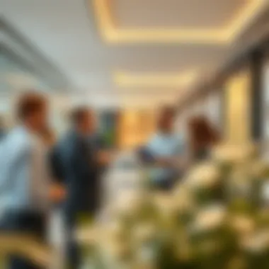 Engaging Experience for Buyers at Aljurf Sales Center Prospective buyers engaging with sales representatives