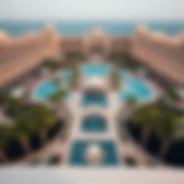 Aerial view of the resort's expansive pool area surrounded by lush landscaping